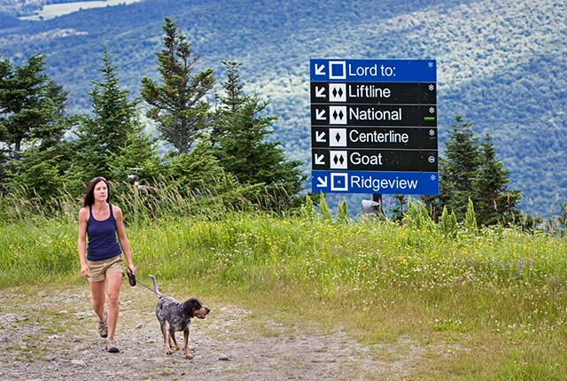 Stowe Resort, VT, woman hiking, summer.