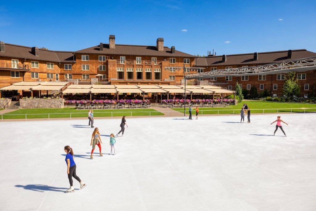 Sun Valley Resort during the summer as people ice skate outside of lodge