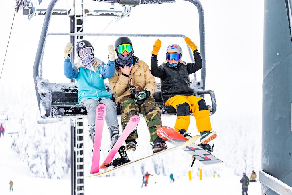 Group of friends smiling on lift at Timberline lodge